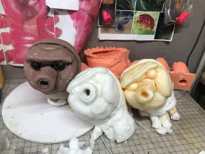 Foam head with rubber skin