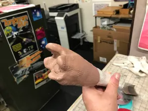 Initial hand sculpture