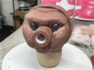 Head covered with aluminum mesh
